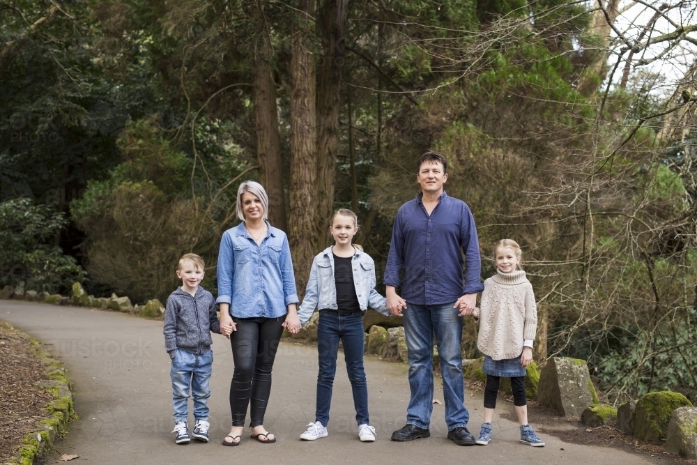 Family holding hands - Australian Stock Image