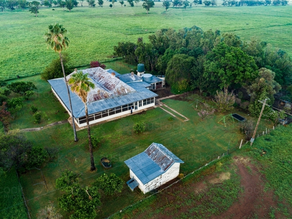 Farm homestead among green paddocks - Australian Stock Image