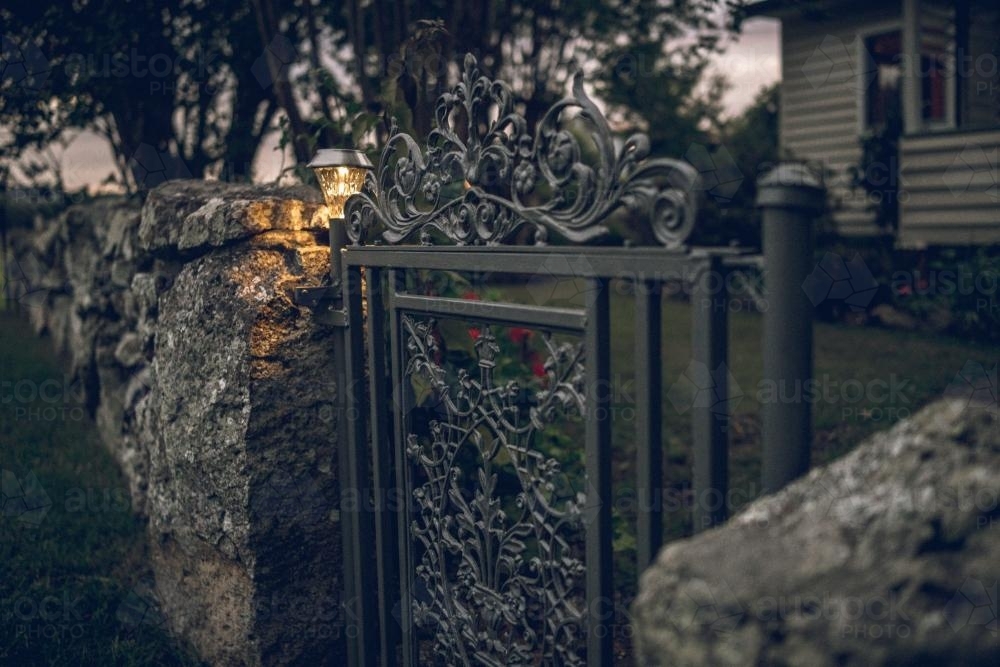 Farm house iron gate in the evening - Australian Stock Image