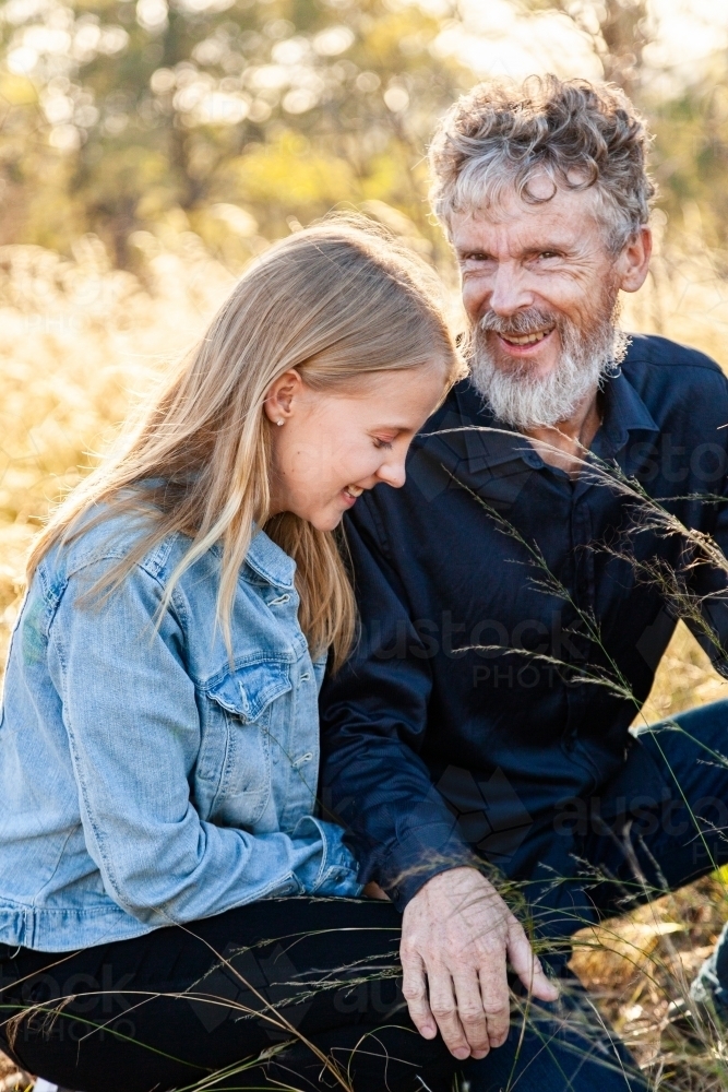 Father talking to teenage daughter - Australian Stock Image