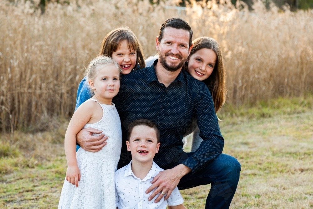 Father with four children - Australian Stock Image