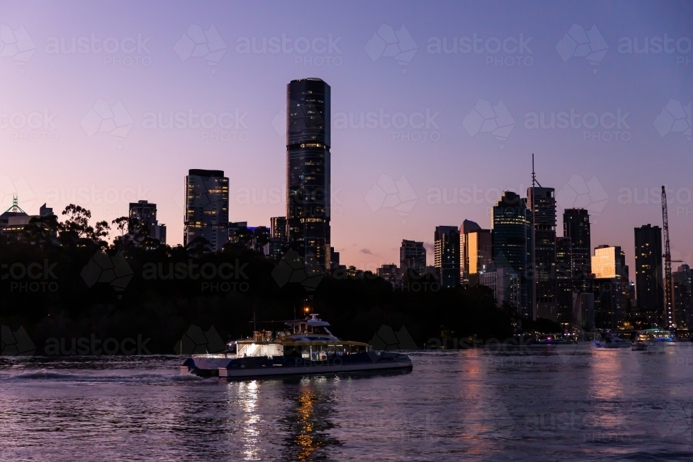 Ferry on the Brisbane River after dusk - Australian Stock Image