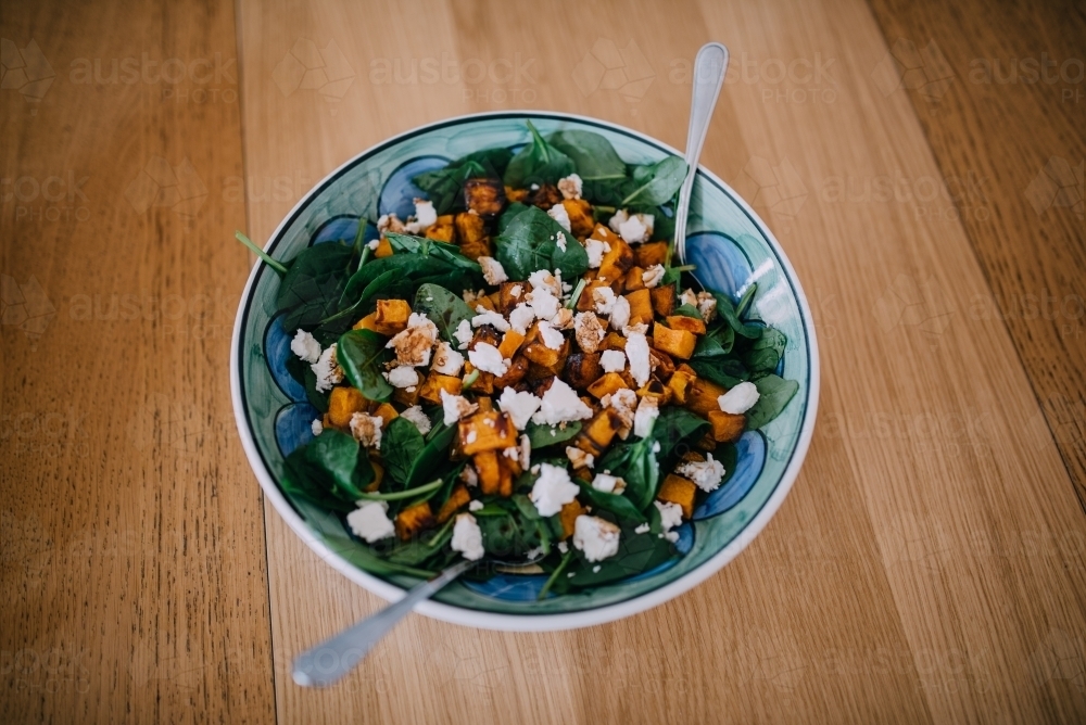 Feta, pumpkin and spinach salad - Australian Stock Image