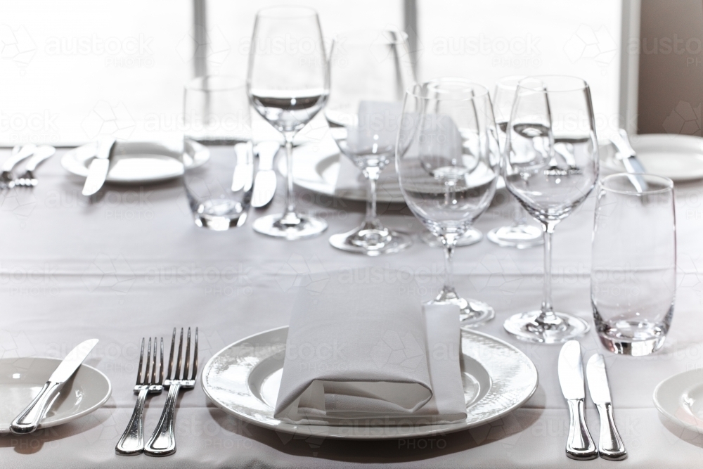 Image of Fine dining table setting - Austockphoto