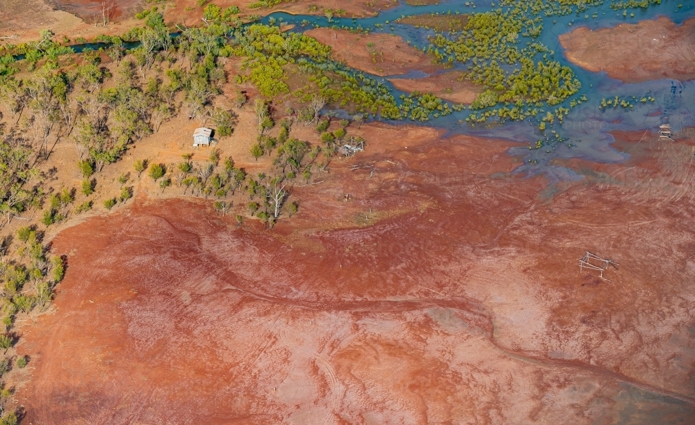 Fishing hut, shelters and illegal causeway neat the Narrows - Australian Stock Image