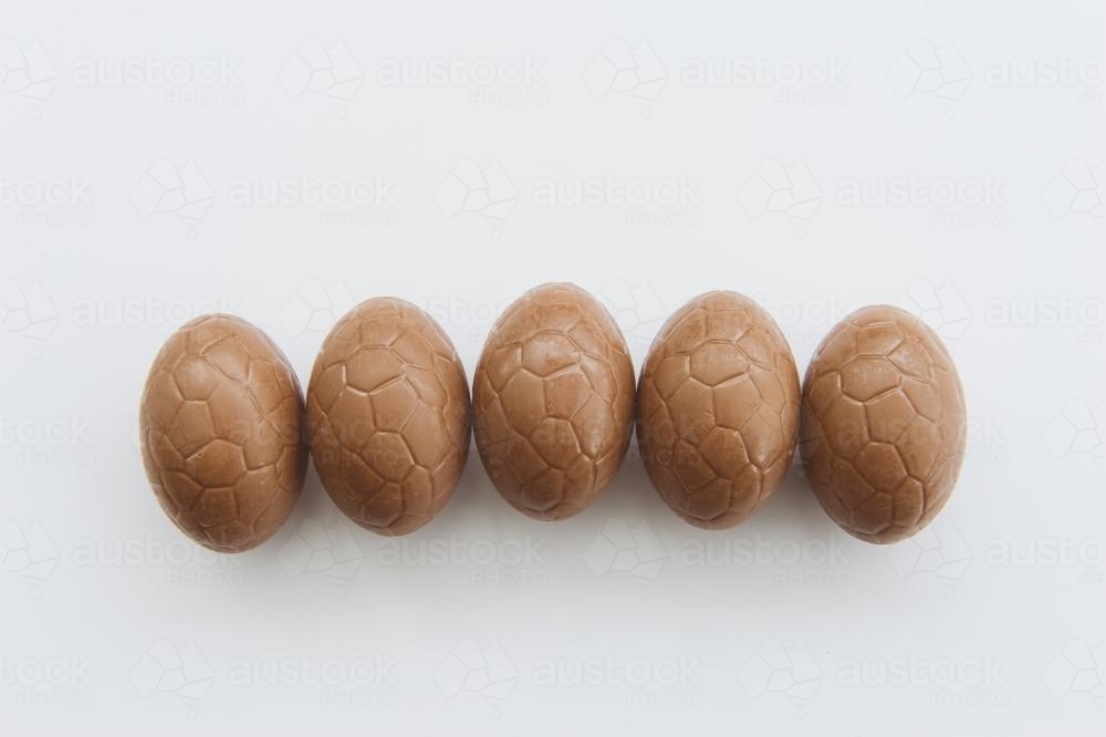 Five easter eggs on white background - Australian Stock Image