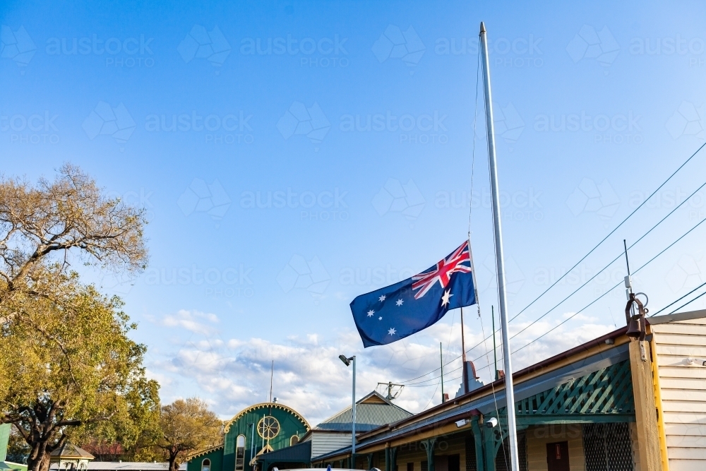 Flag on pole at half mast in memorial of the death of the queen - Australian Stock Image