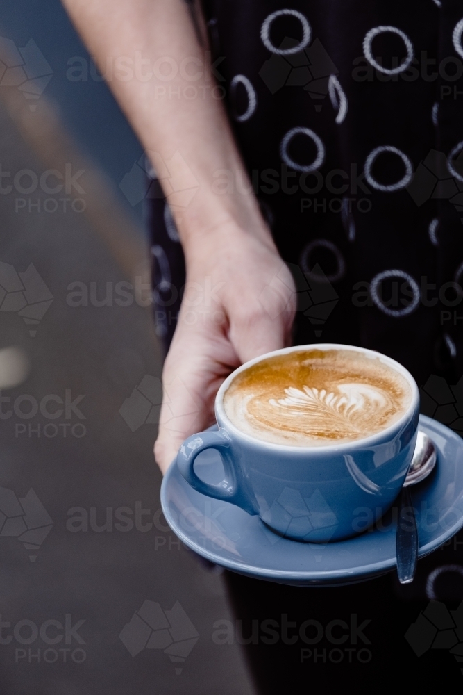 Flat white coffee with coffee art. - Australian Stock Image