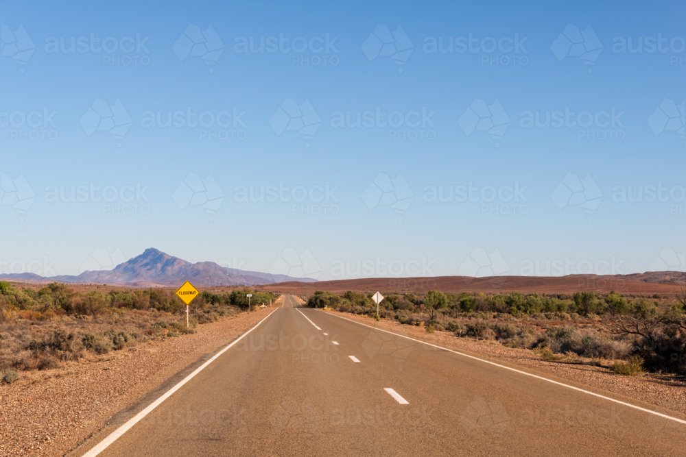 Floodway road sign on side of road, Flinders Ranges, South Australia - Australian Stock Image
