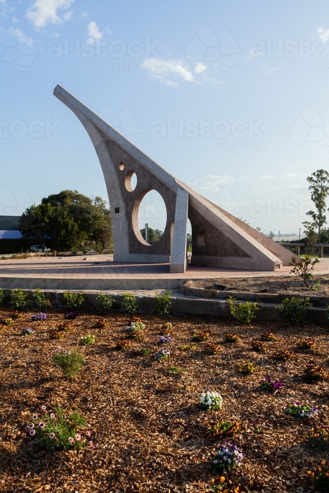 Flowers in garden around sundial in Singleton - Australian Stock Image