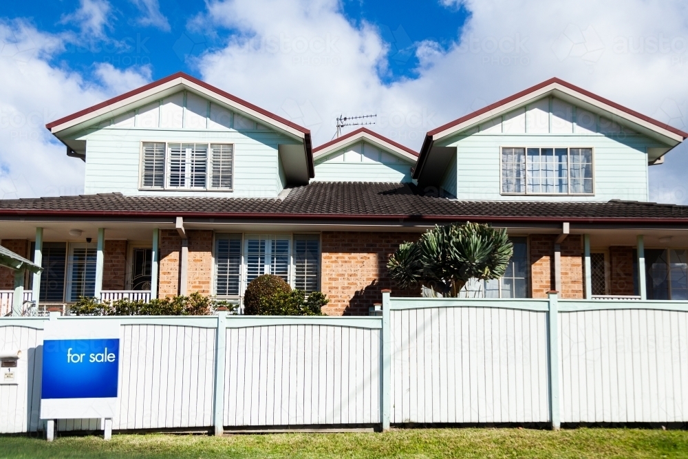 For Sale sign outside home - Australian Stock Image