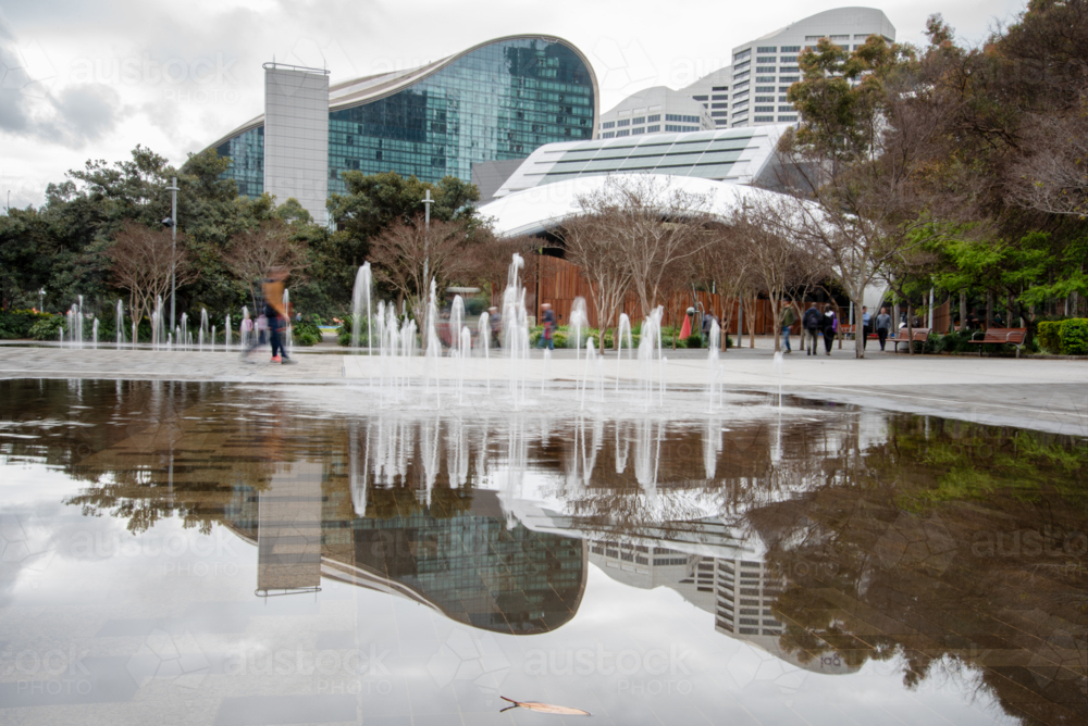 Fountain and reflection at Tumbalong Park, Darling Harbour - Australian Stock Image