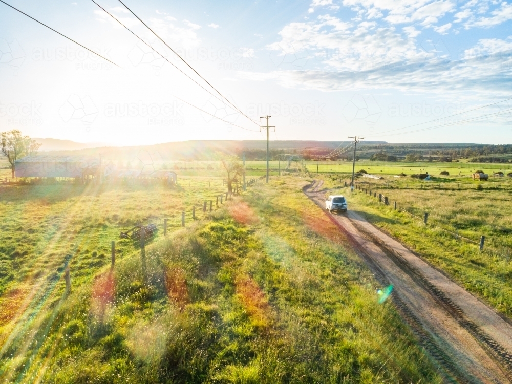 Four wheel drive car on country road trip driving on gravel road - Hope and adventure concept - Australian Stock Image