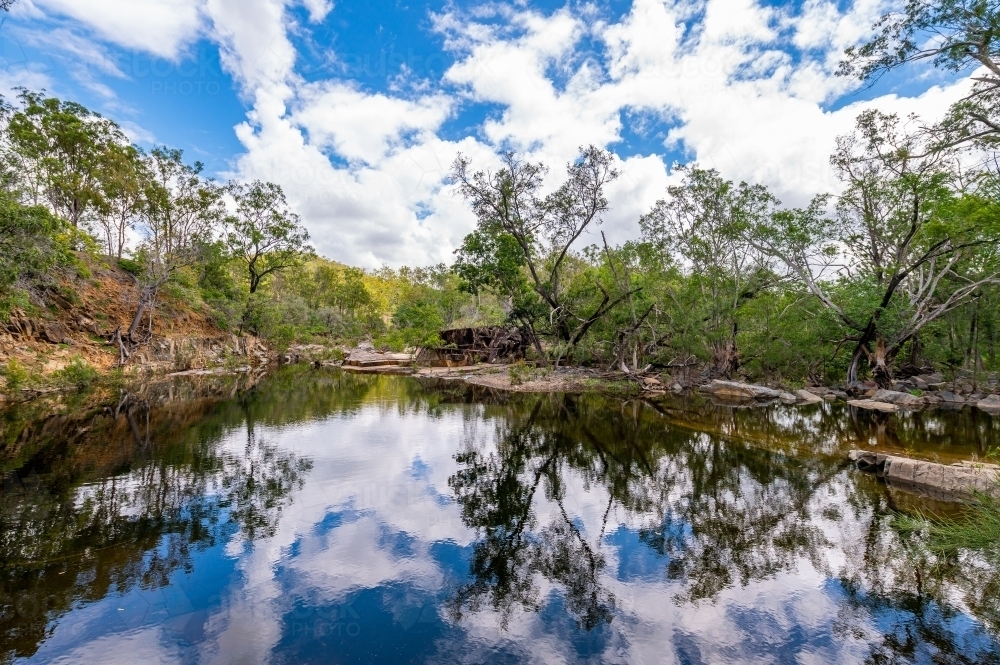 Fresh water creek and swimming hole in the summer - Australian Stock Image