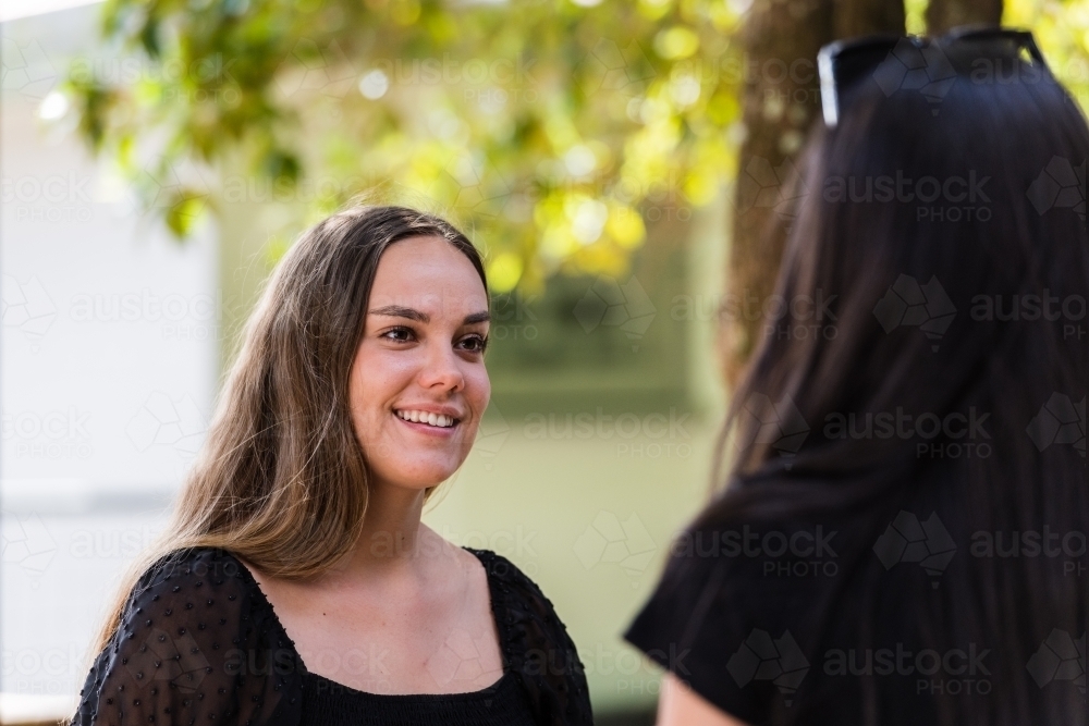 friends chatting - Australian Stock Image