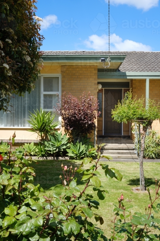 Image of Front Yard Entrance to a Mid Century Home - Austockphoto