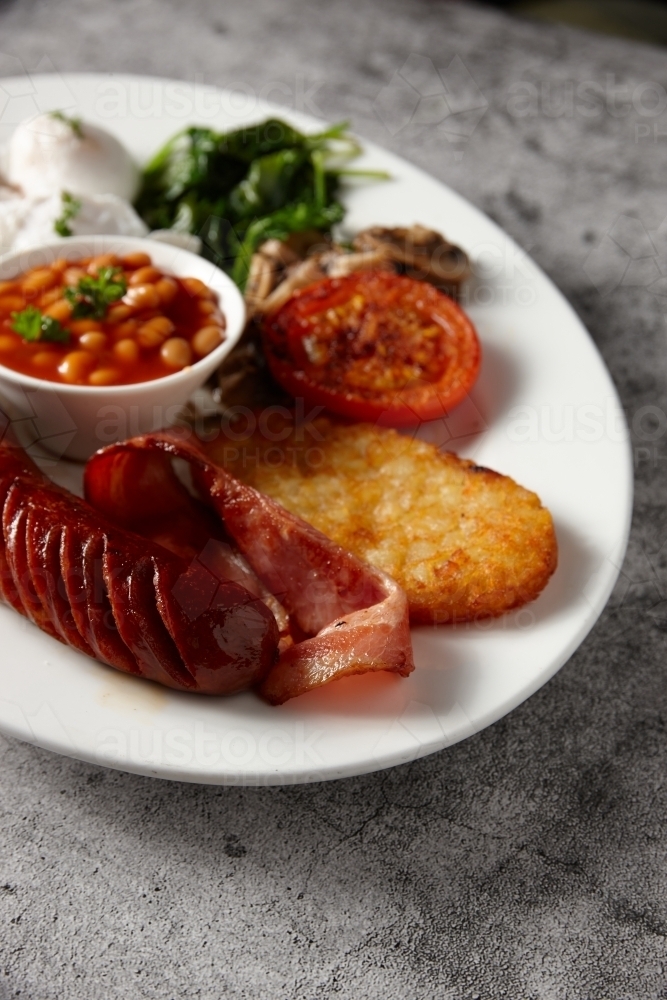 Full breakfast meal served on a white plate - Australian Stock Image