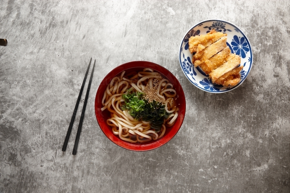 Garnished noodle soup with chicken katsu - Australian Stock Image