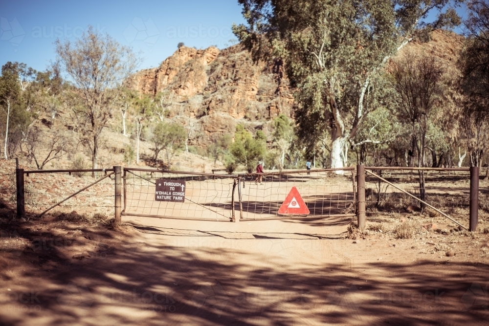 Gate to walking track in outback Northern Territory - Australian Stock Image