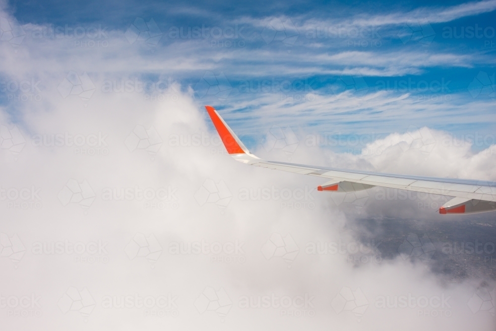 generic scene from plane window, with clouds - Australian Stock Image