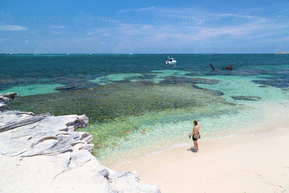 Girl Standing on the Beach - Australian Stock Image