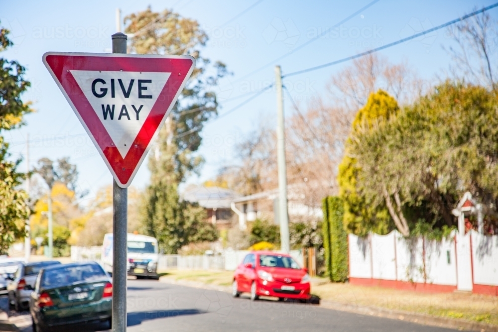 Give Way road sign in urban setting with bright daylight - Australian Stock Image