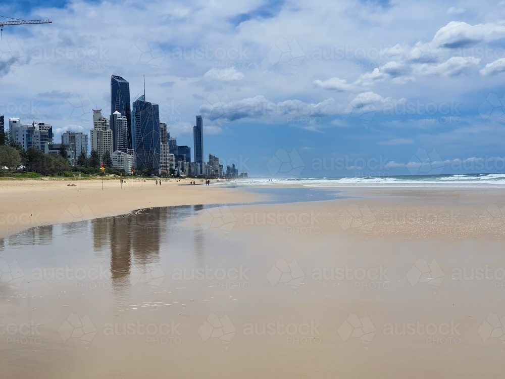 Gold Coast beach with city skyline in the background - Australian Stock Image