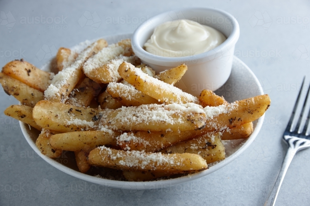 Gourmet hot chips with mayonnaise dip - Australian Stock Image