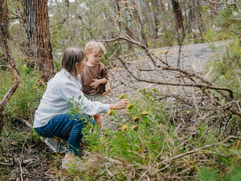 Grandmother spending time with grandson in nature - Australian Stock Image