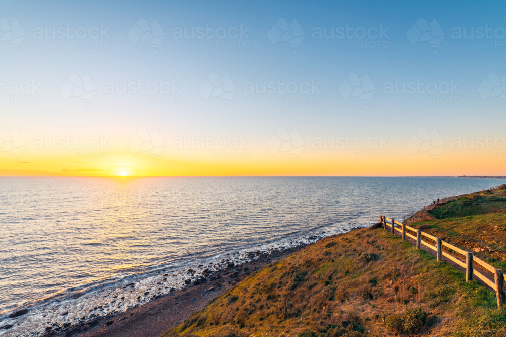 Hallett Cove Conservation Park Coastal Walkway along the coast with sea views at sunset - Australian Stock Image