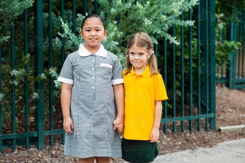 Happy Aussie school kids standing together - Australian Stock Image