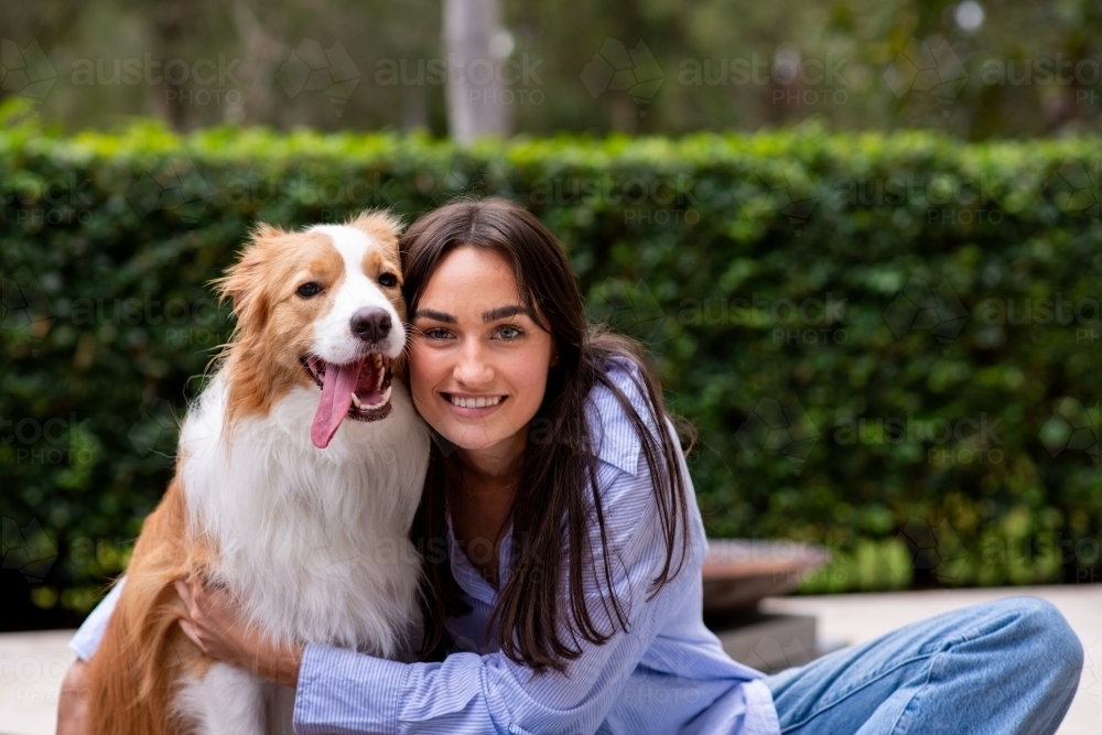 happy dog with owner - Australian Stock Image