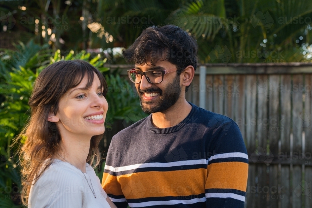 happy mixed race couple together - Australian Stock Image