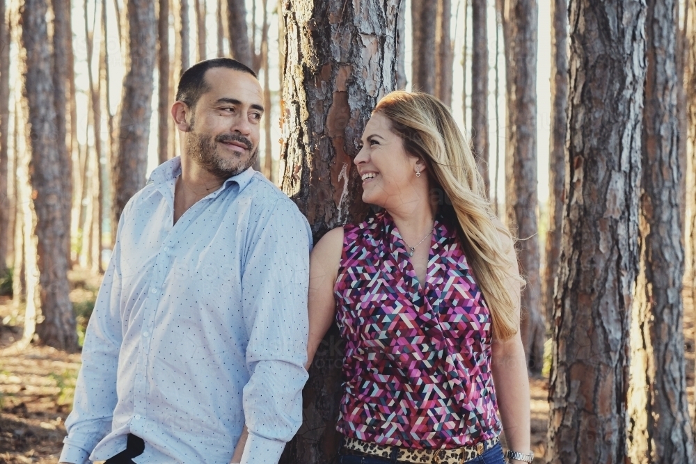 Happy multicultural couples in the wood - Australian Stock Image