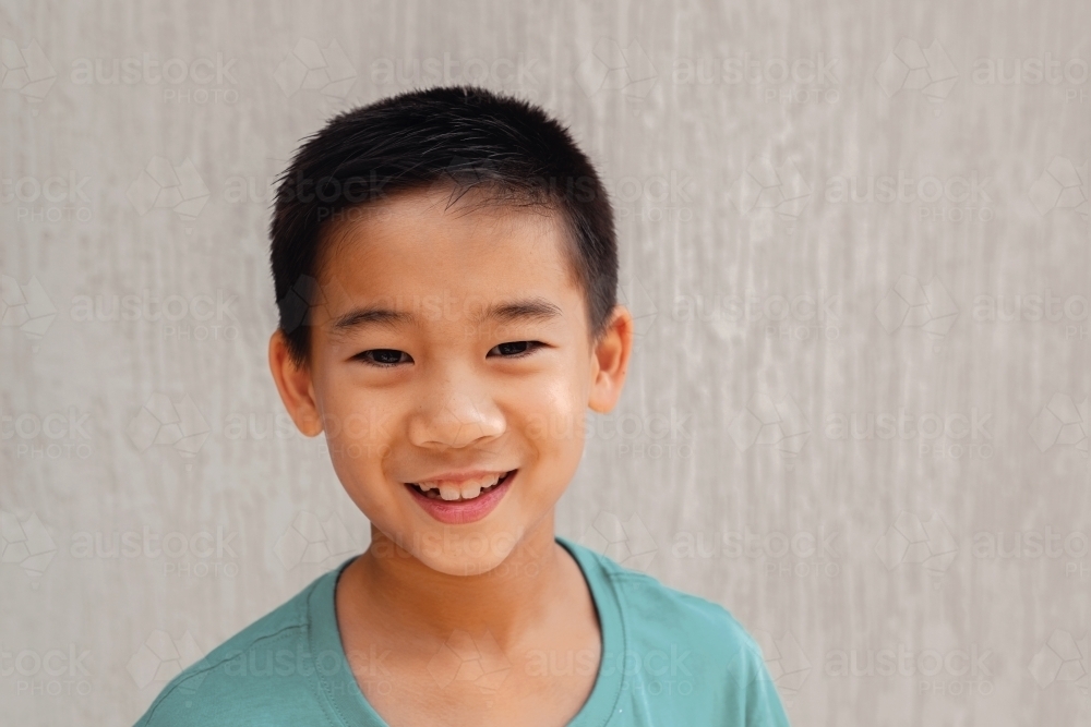 Image of Happy multicultural young boy - Austockphoto