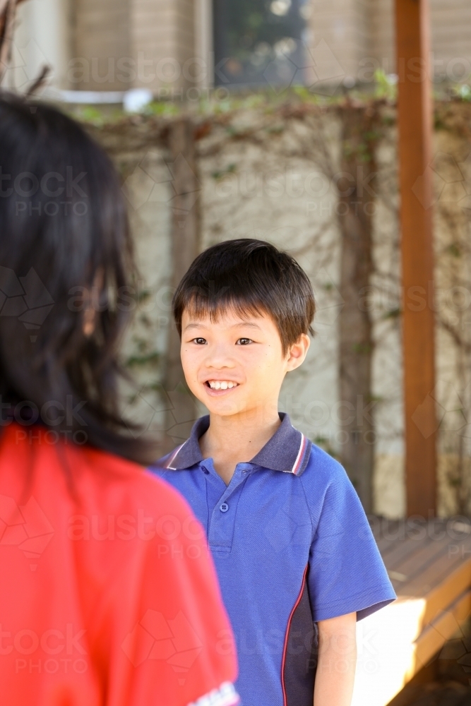 Happy primary school student - Australian Stock Image