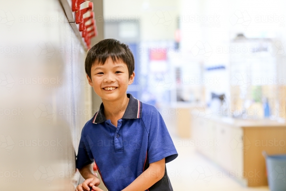 Happy primary school student - Australian Stock Image