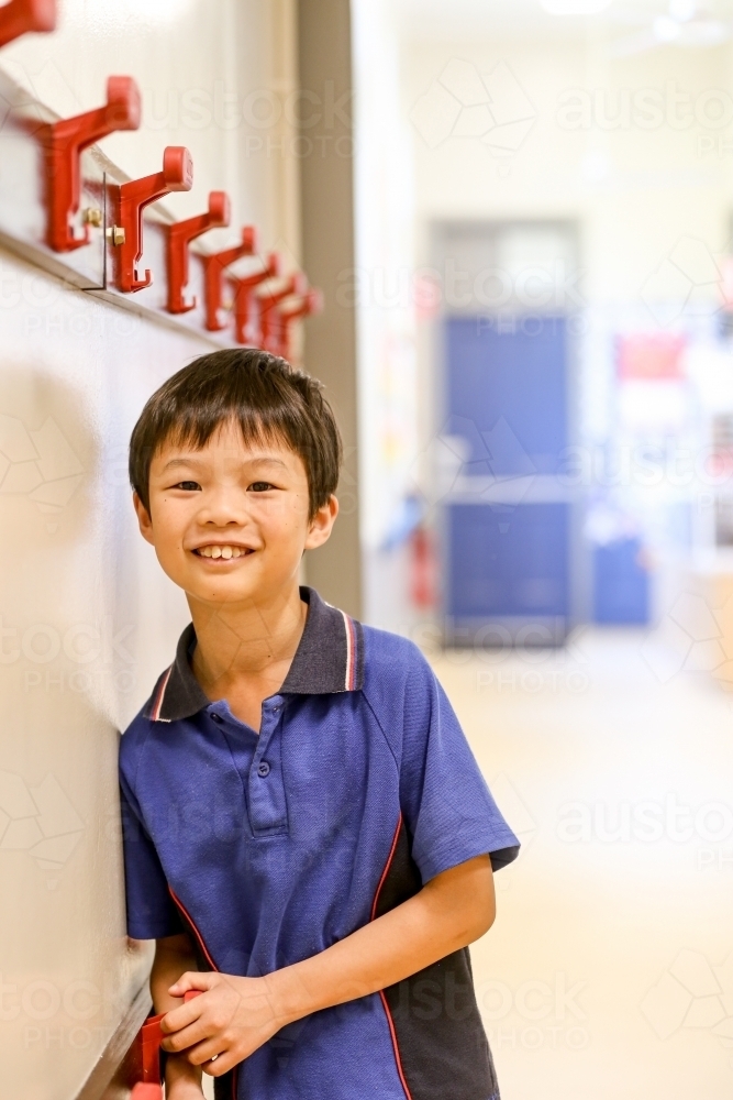 Image of Happy primary school student - Austockphoto