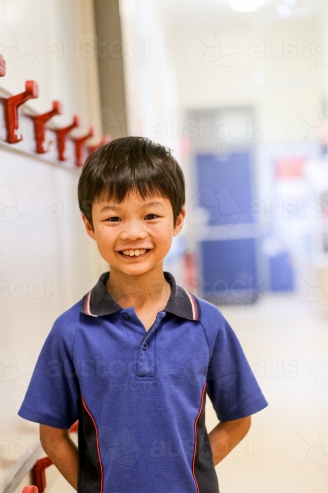 Happy primary school student - Australian Stock Image