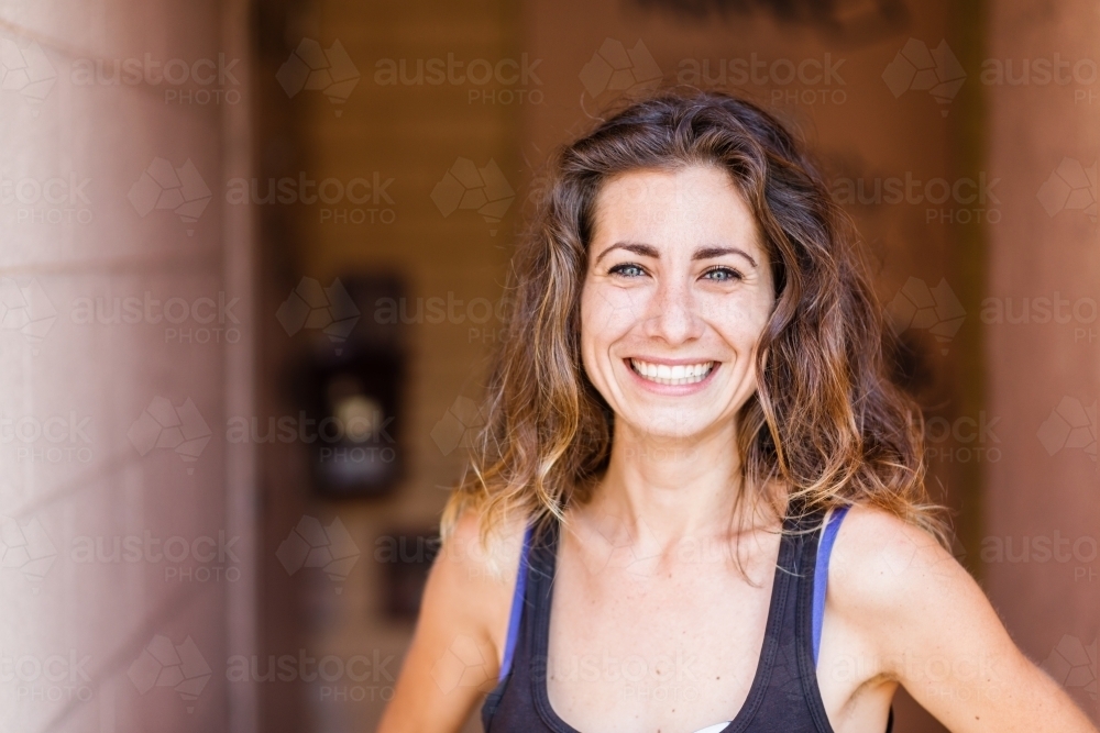 happy smiling woman in the city - Australian Stock Image