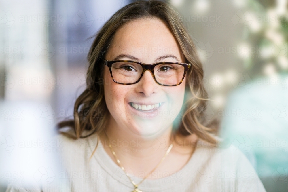 happy young woman at home.  - Australian Stock Image