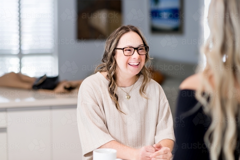 happy young woman. from a series featuring a woman with Down Syndrome - Australian Stock Image