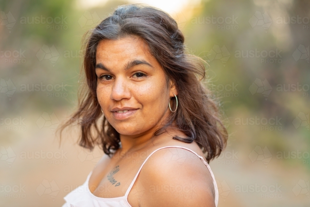Image Of Head And Shoulders Of Young Aboriginal Woman Outdoors With Blurry Background Austockphoto