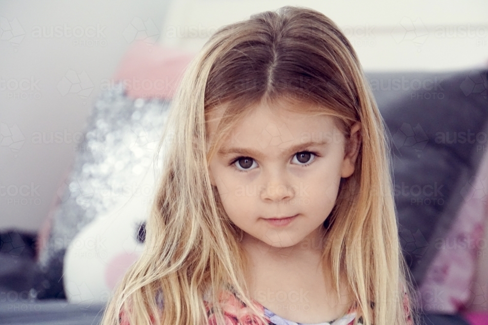 Headshot of 5 year old looking at camera - Australian Stock Image