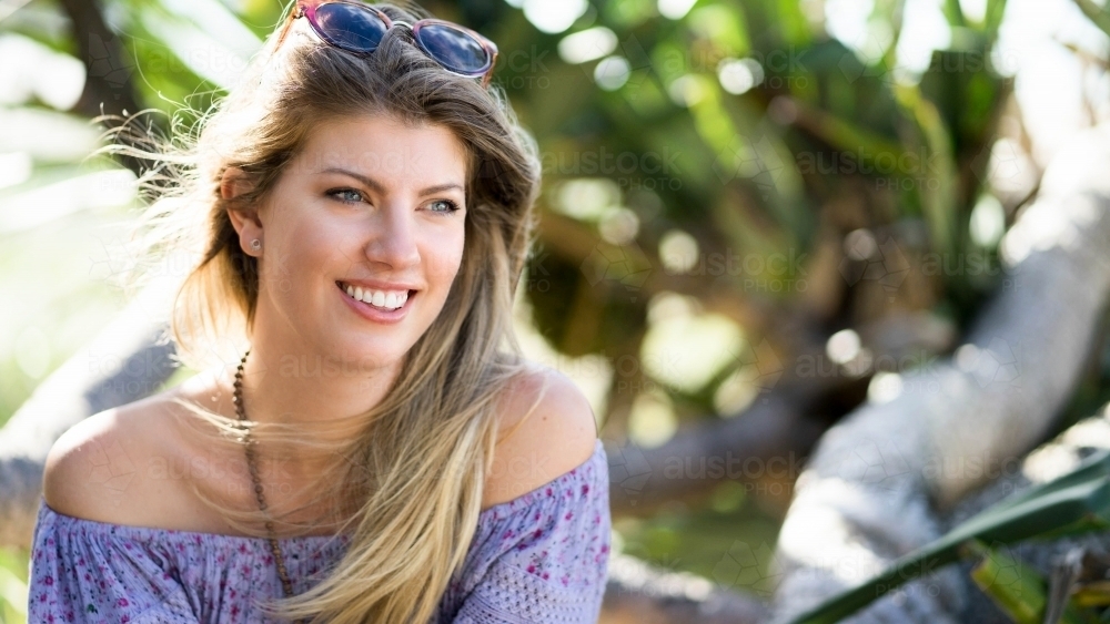 Headshot of woman looking off camera - Australian Stock Image