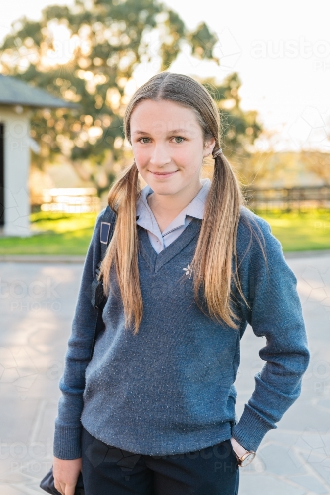 high school student in navy winter uniform - Australian Stock Image