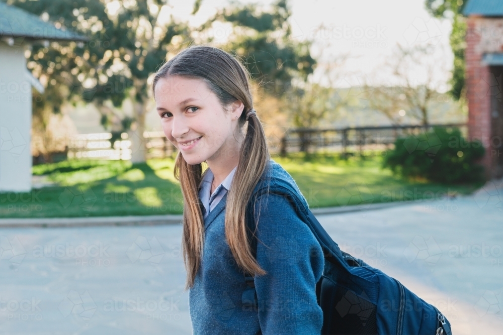 high school student in navy winter uniform - Australian Stock Image