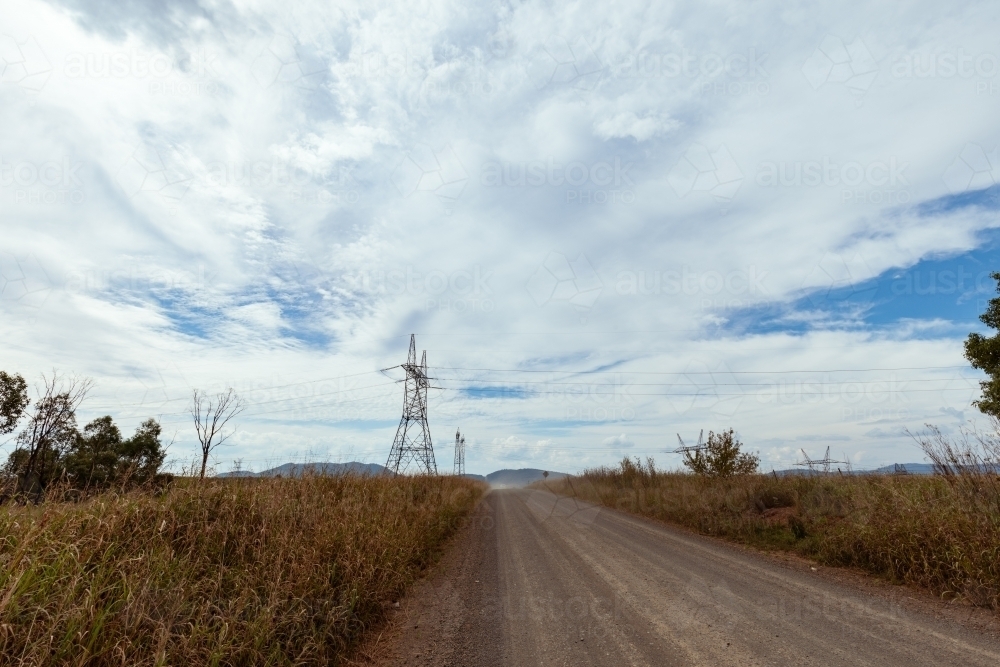 High voltage power lines in paddock near Tamworth, New South Wales - Australian Stock Image