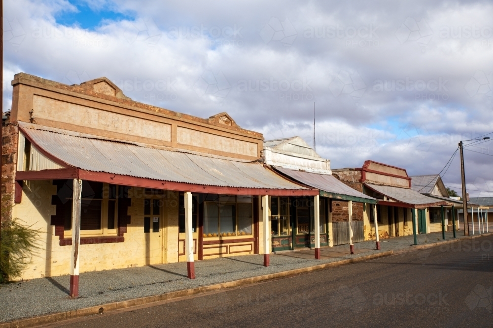 historic shops in an abandoned street - Australian Stock Image