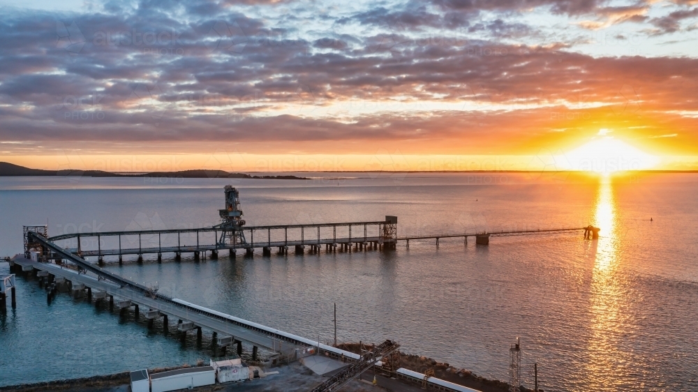 Horizontal shot of a wharf at sunset - Australian Stock Image